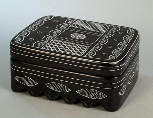 a large black box with white designs
