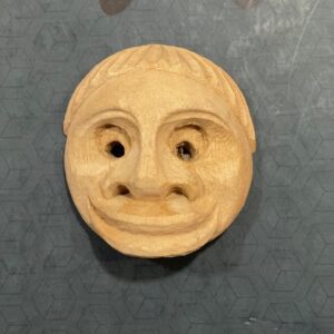 a wooden mask