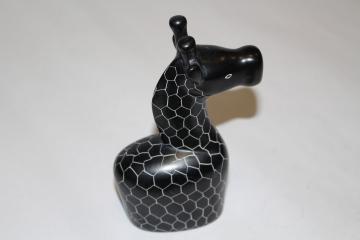 black giraffe sculpture