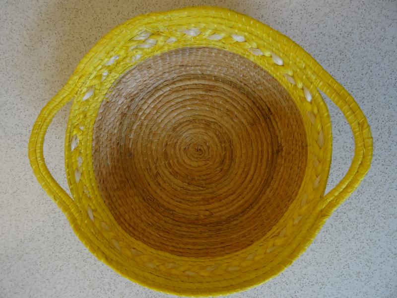 a yellow weaved basket