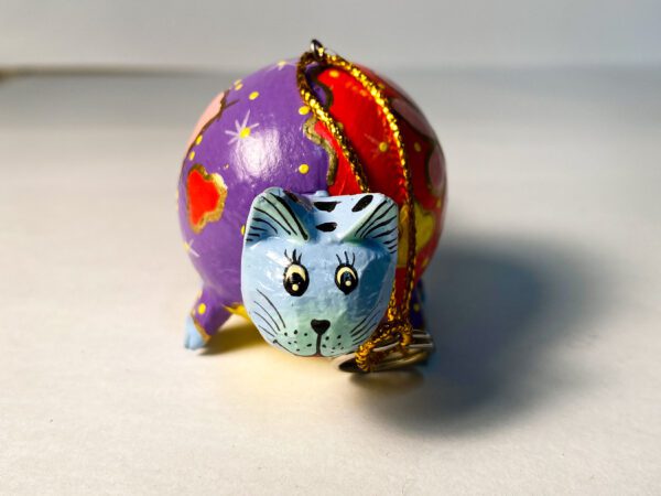 A Violet and Red Color Painted Cat Figure
