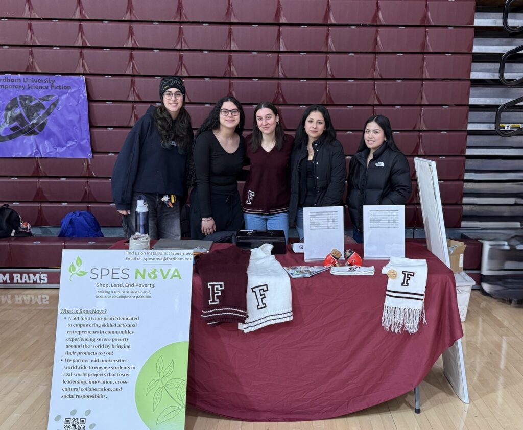 Group of people at an informational booth.